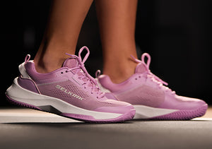 Women's CourtStrike Pickleball Shoes in pink, showing side view on a foot.