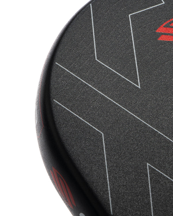 Close-up view of the Selkirk LUXX Control Air Invikta pickleball paddle face with textured surface.