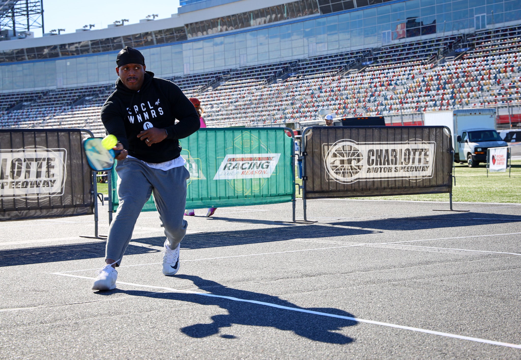 A person playing pickleball at Charlotte Motor Speedway