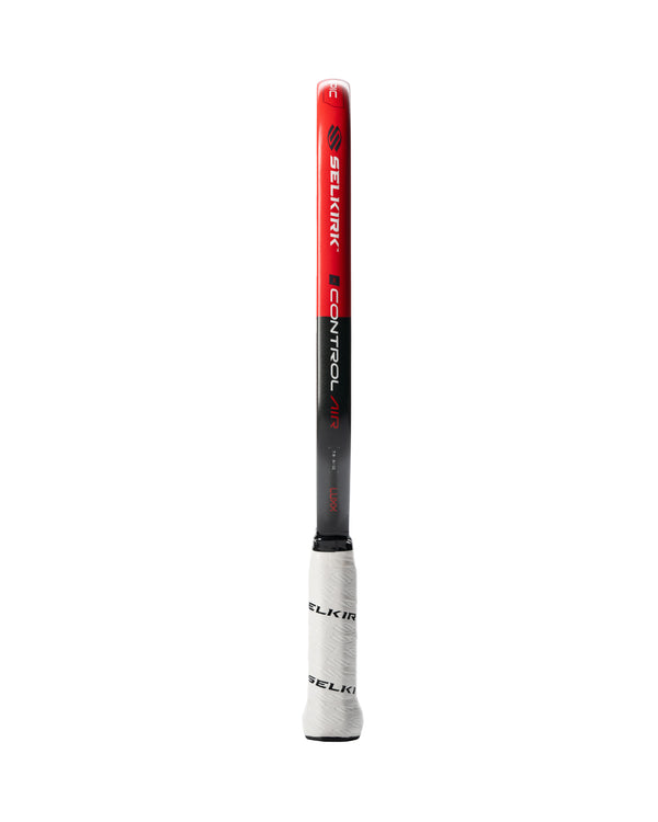 Selkirk LUXX Control Air pickleball paddle in red with a white grip, showcasing its design and features.