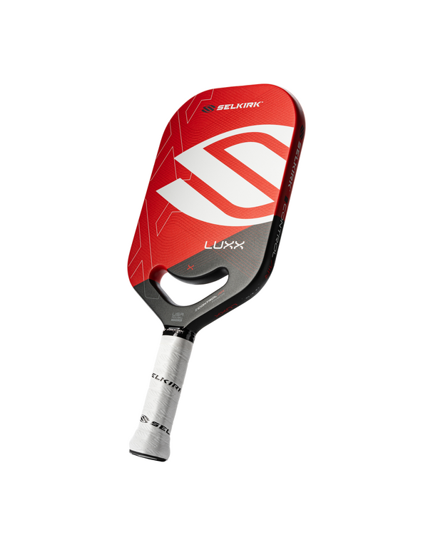 Selkirk Luxx Control Air Invikta Pickleball Paddle in gold with white handle.
