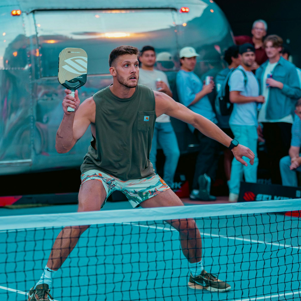 James Neal preparing to hit a pickleball during a match in Nashville