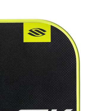 Close-up of SLK Nexus Max pickleball paddle showing logo and edge design