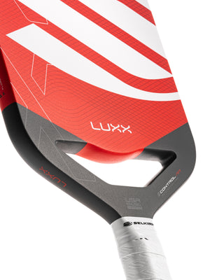 Selkirk LUXX Control Air Pickleball Paddle with InfiniGrit in the Invikta paddle shape. In blue, red, and purple.