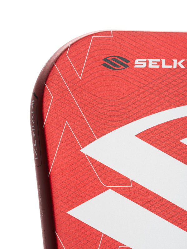 Selkirk LUXX Control Air Pickleball Paddle with InfiniGrit in the Invikta paddle shape. In blue, red, and purple.
