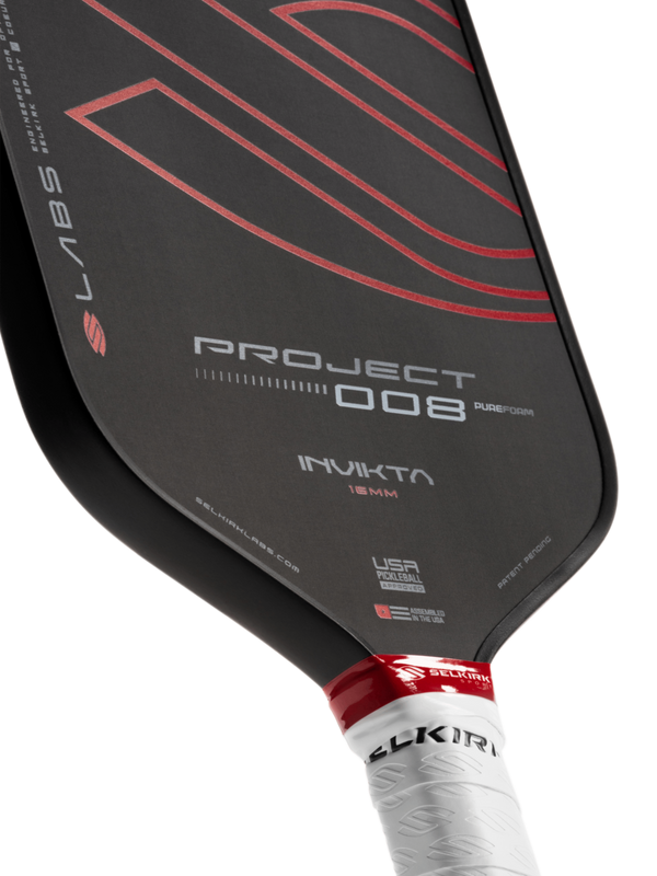 Selkirk LABS Project 008 pickleball paddle in black and red.
