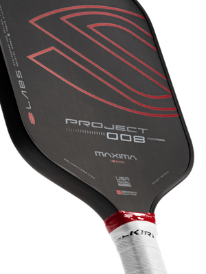 Selkirk LABS Project 008 pickleball paddle in black and red.