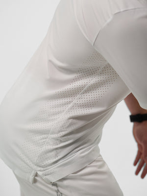 Close-up of Men’s Pro Line Athletic Short Sleeve showcasing perforated ventilation panels on a white background