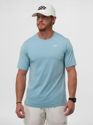 Man wearing a light blue Men's Pro Line Athletic Short Sleeve shirt