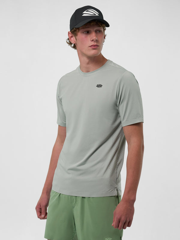 Model wearing a light green Men's Pro Line Athletic Short Sleeve shirt and green shorts