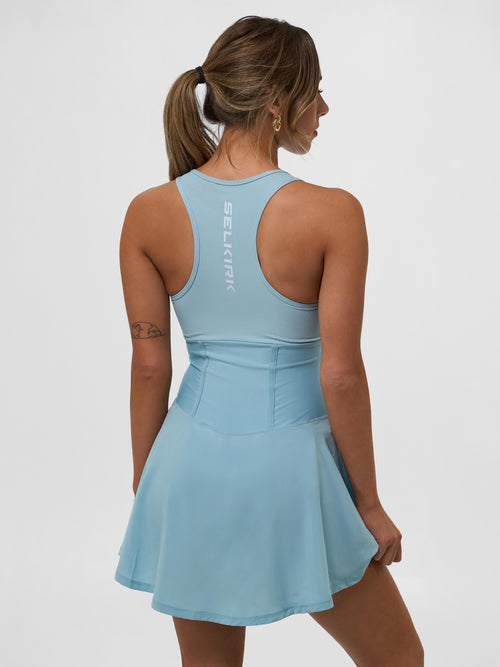 Back view of Selkirk Sport Women's Pro Line Pickleball Dress in light blue, showcasing the design and fit.