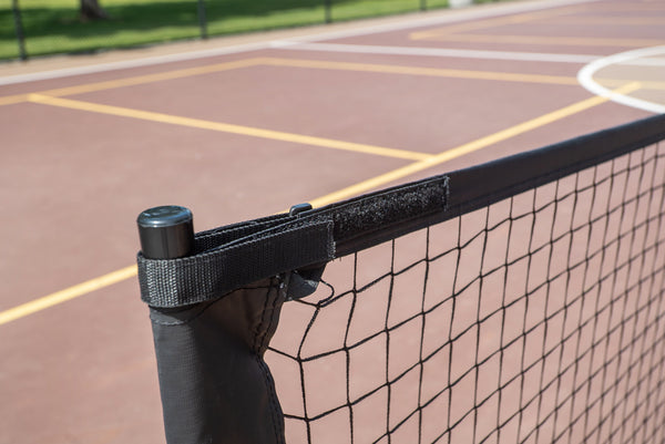 Close-up of the SLK Pro Portable Pickleball Net's top edge and tensioning system.