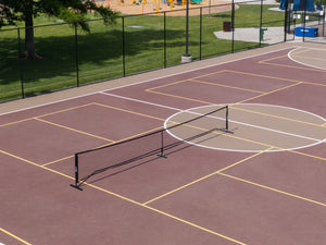 Aerial view of the SLK Pro Portable Pickleball Net set up on a court.