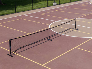 SLK Pro Portable Pickleball Net set up on a court