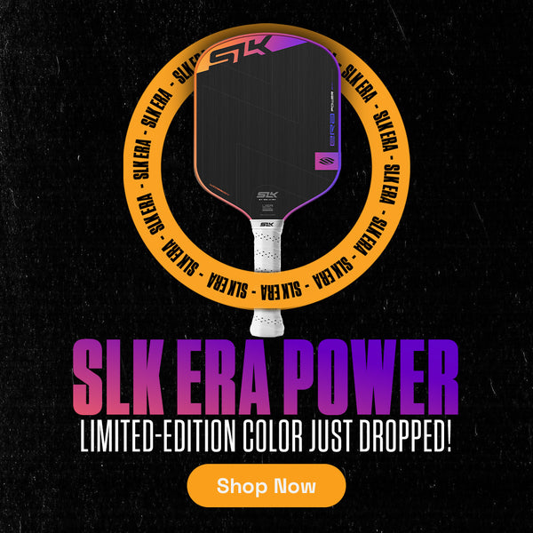 An orange and purple ERA Power paddle