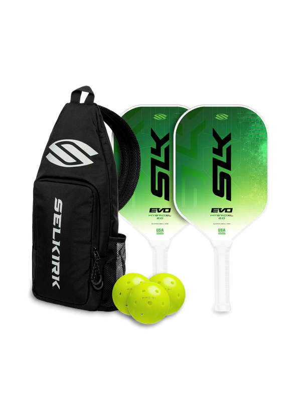 Selkirk SLK EVO hybrid pickleball paddle bundle in green.