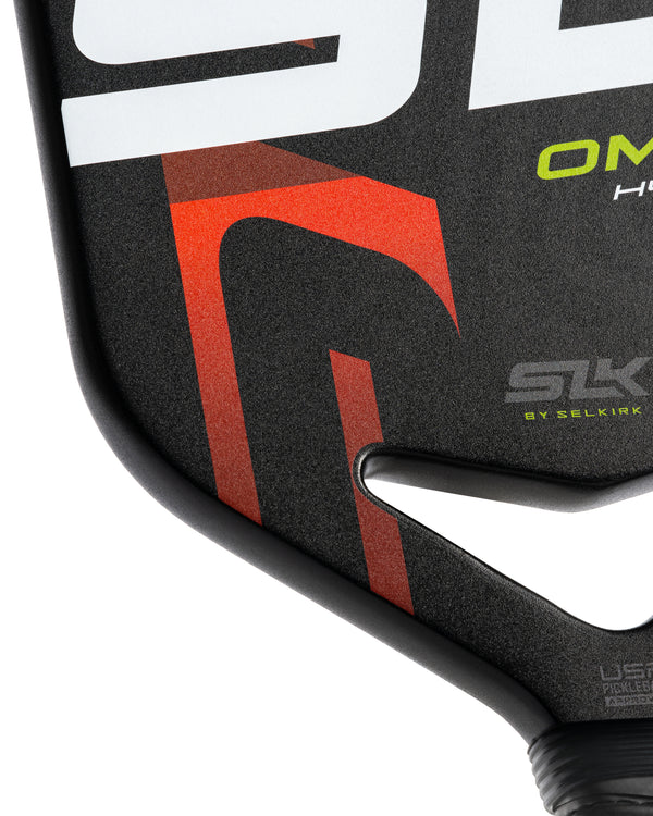 SLK OMEGA Hybrid Air paddle in Ember color, featuring a 12k UltraWeave Carbon Fiber Face and ProSpin+ Texture.
