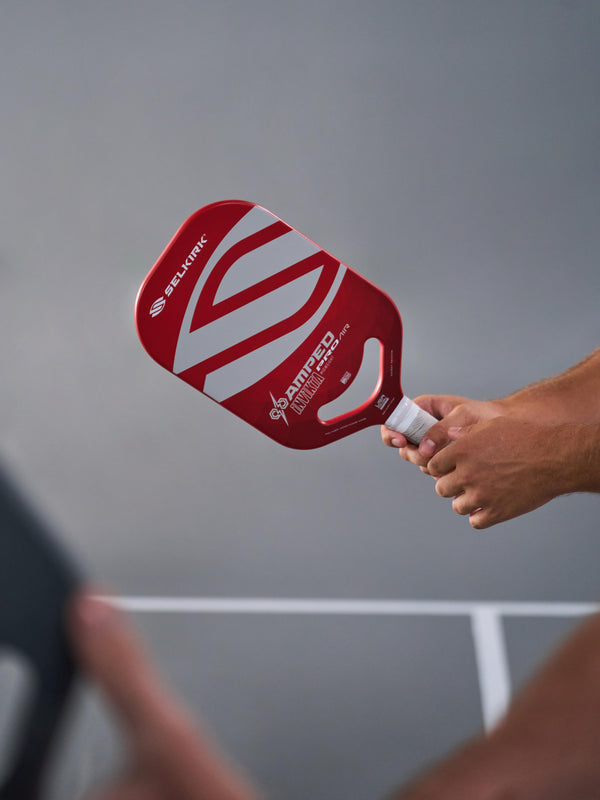 Introducing the Selkirk AMPED Pro Air Pickleball Paddle, with a blend of power and control. The AMPED Pro Air Invikta paddle from Selkirk Sport comes in red, purple, green, blue, and silver.