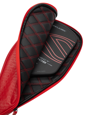 Selkirk LABS Project 008 13mm Invikta paddle in a red protective case