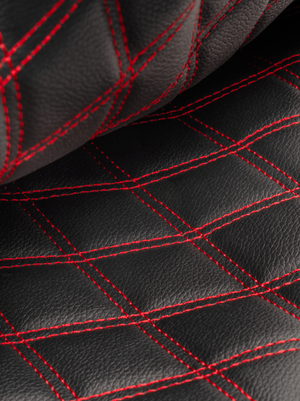 Close-up of black material with red stitching, used in Selkirk LABS Project 008 13mm Invikta paddle.