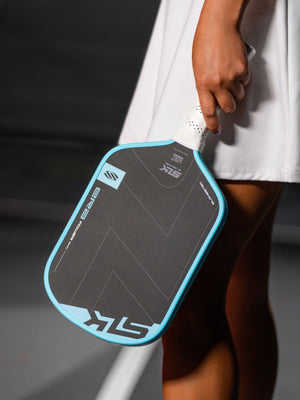 SLK ERA Power pickleball paddle, Cyan, on court 1