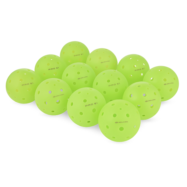 A collection of green Pro S1 Pickleball balls arranged together.