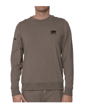 Men's brown crewneck sweatshirt with small 'SELKIRK' logo on left chest and zip pocket on left sleeve.