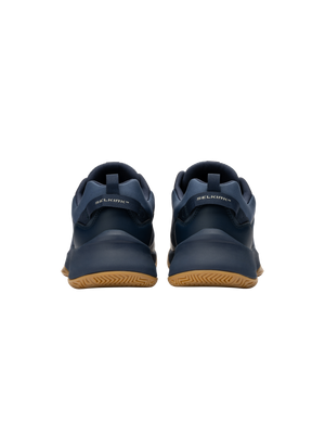 Rear view of navy SELKIRK sneakers showing heel tabs and gum rubber soles.