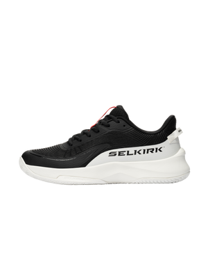 Black and white athletic sneaker, side view, with 'SELKIRK' logo on the heel and textured upper.