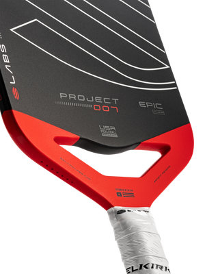 Pickleball paddle face and handle with branding: PROJECT 007, EPIC 14MM, USA PICKLEBALL APPROVED; grip labeled SELKIRK.