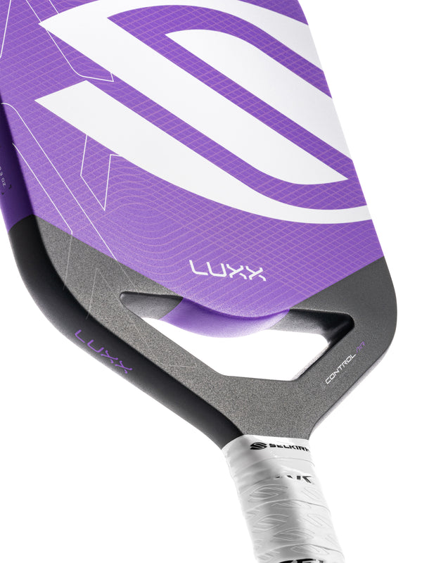 Selkirk LUXX Control Air Pickleball Paddle with InfiniGrit in the Epic paddle shape. In blue, red, and purple.