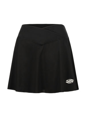 Black athletic skort with crossover waistband and small white stylized S logo at lower-right hem
