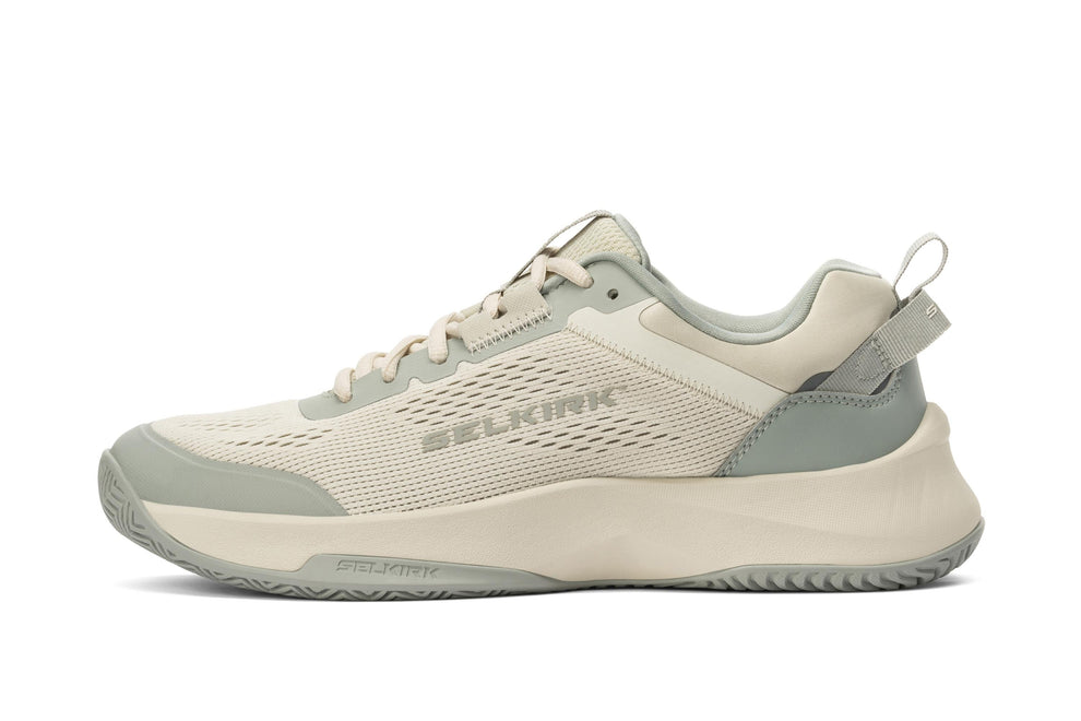 Beige men's court pickleball shoe, mesh upper and cushioned sole, SELKIRK logo on side and 'S' on heel tab