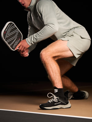 A player wearing Men's CourtStrike Pickleball Shoes in action on the court.