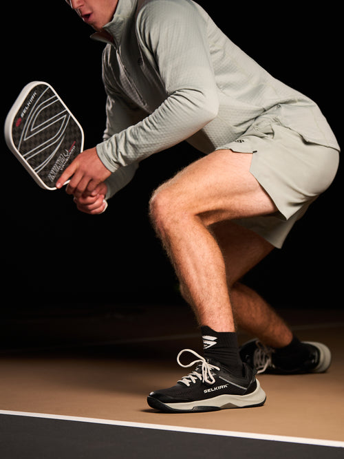 A player wearing Men's CourtStrike Pickleball Shoes in action on the court.