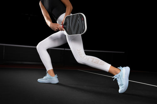 Women's CourtStrike Pro Pickleball Shoes in Blackout, worn during play on a court