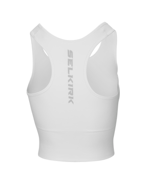 White racerback crop sports bra, back view, with vertical SELKIRK logo down center