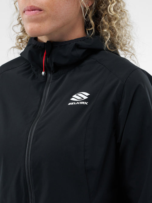 Selkirk Sport Essentials women’s hooded full-zip pickleball windbreaker jacket.