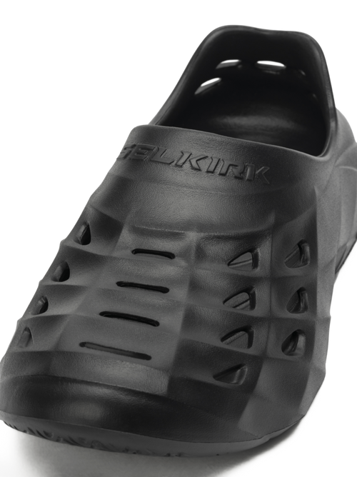 Lightweight black Selkirk Sport Renew Pickleball Recovery Shoe with perforated design.