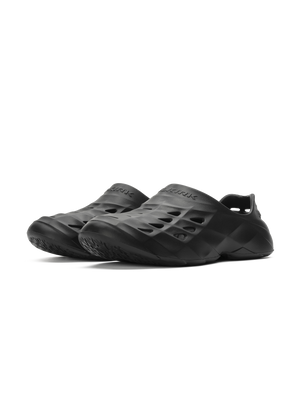 Selkirk Sport Renew Pickleball Recovery Shoe in Blackout color, featuring a slip-on design and perforated upper for breathability.