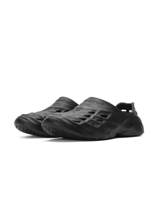 Selkirk Sport Renew Pickleball Recovery Shoe in Blackout color, featuring a slip-on design and perforated upper for breathability.