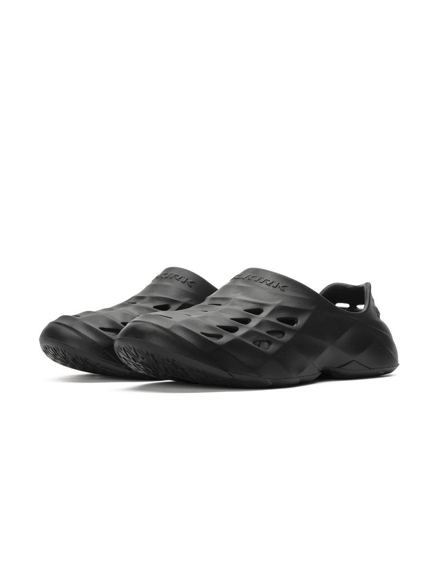 Selkirk Sport Renew Pickleball Recovery Shoe in Blackout color, featuring a slip-on design and perforated upper for breathability.
