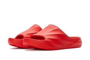 Red Selkirk pickleball slides with a textured design.