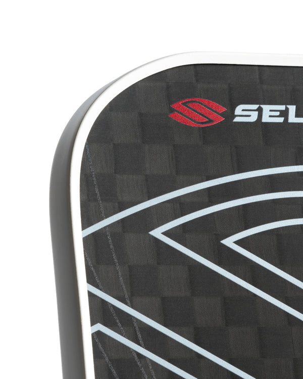 Close-up of the VANGUARD Pro pickleball paddle showing the Selkirk logo and design details.