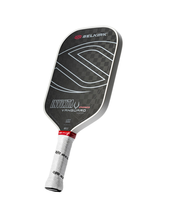 Selkirk VANGUARD Pro Invikta pickleball paddle with a checkered design and white grip