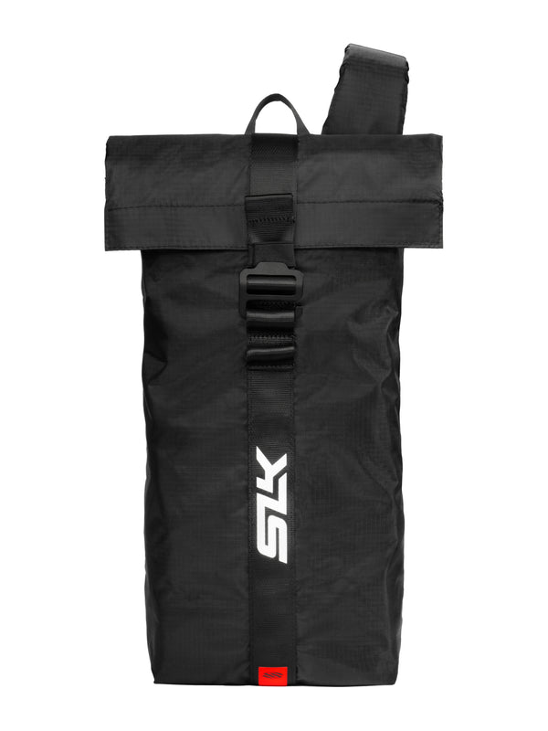 Black roll-top backpack with front buckle and vertical white "SLS" logo