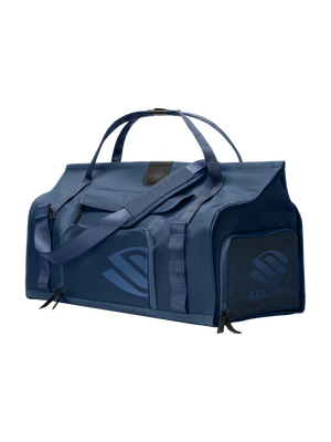 Front-right view of Selkirk Pro Line 2.0 duffel bag with top handles, padded shoulder strap and exterior zip pockets on dark background