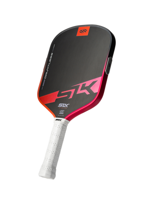 Angled view of Dauntless pickleball paddle showing widebody face, red-orange edge and white handle on black background