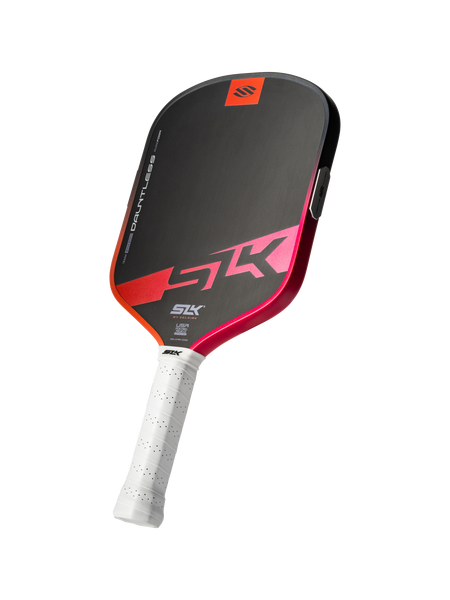Selkirk SLK Dauntless widebody pickleball paddle in electric sunset red, shown face-on