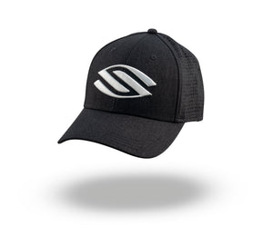 Black baseball cap with perforated mesh back and white embroidered abstract logo, shown floating with soft shadow